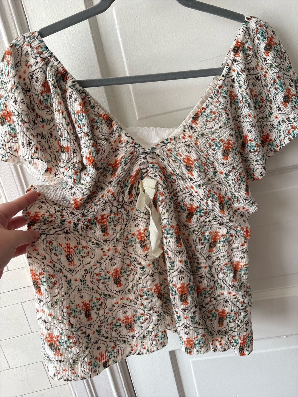Anthropologie deep v patterned top